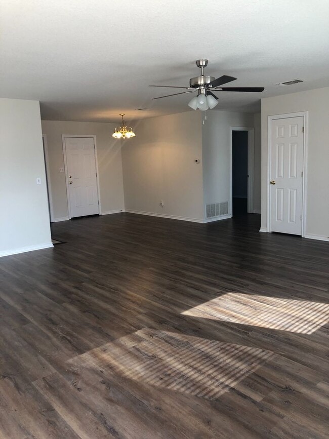 Photo - Full Brick 3 bed 2 bath 2 car Garage with fenced back yard! All new paint, Flooring, appliances!!