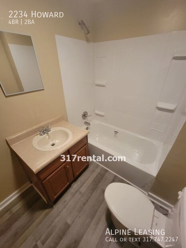 Photo - 4/2 with garage/workshop combo (has workin...