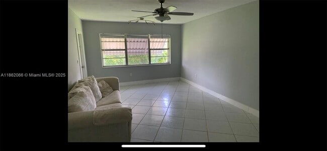 Building Photo - 6720 Arbor Dr Unit 210