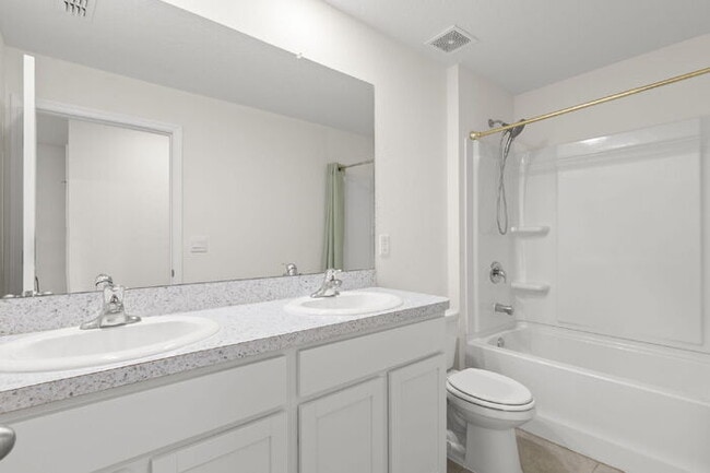 Photo - "Spacious 4-Bedroom Retreat with 3 Full Baths - 2260 Sq Ft of Comfort in Parrish, FL!"