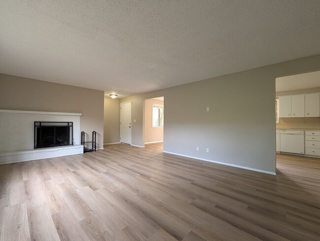 Photo - Bright 3 bedroom/ 1 bathroom Duplex with a fireplace and covered parking!