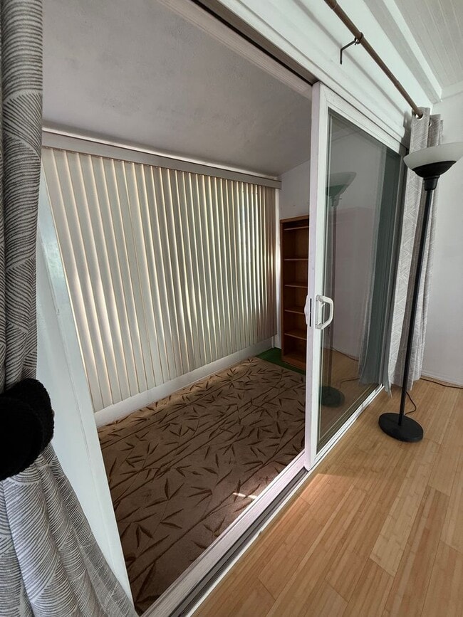 Photo - Hard floors, extra closets, patios & fence...