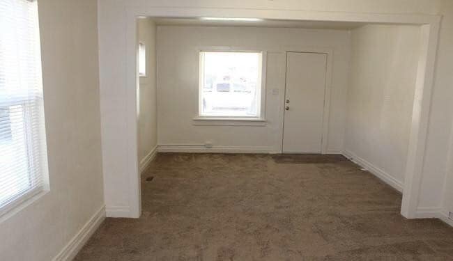 Building Photo - 1000 S Denver St Unit 1