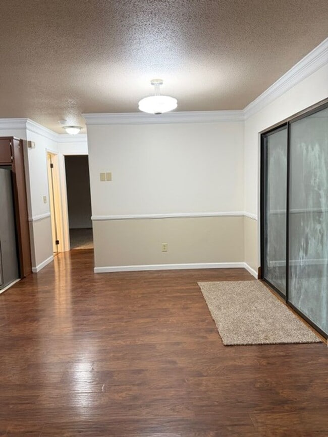 Photo - 2 Bedroom 1 Bath Duplex with garage/basement, side porch, and carport.