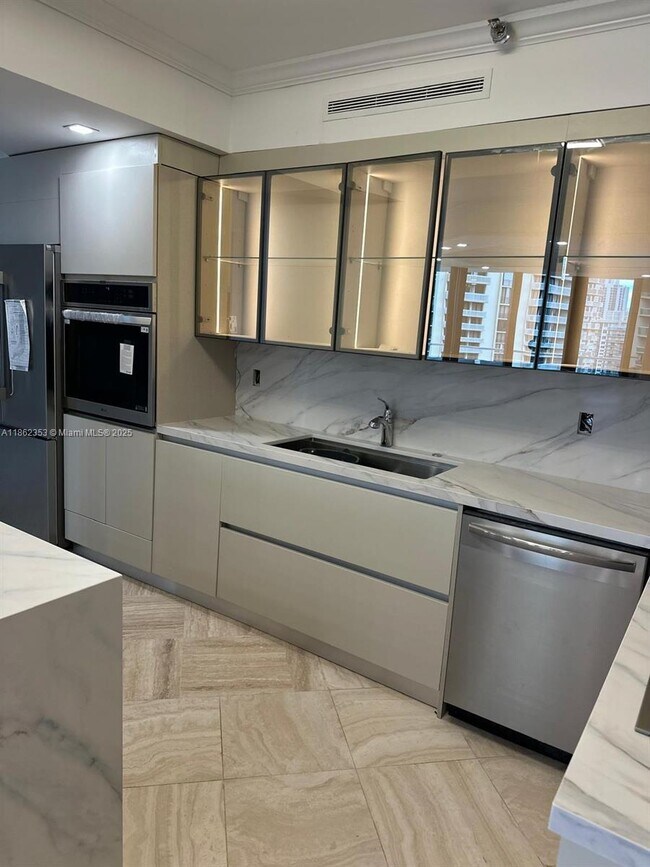 Photo - 19500 Turnberry Way Unit 12E