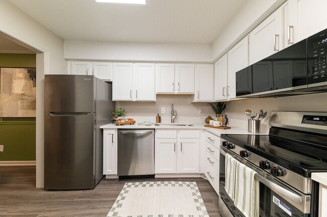Kitchen with granite counters and stainless appliances