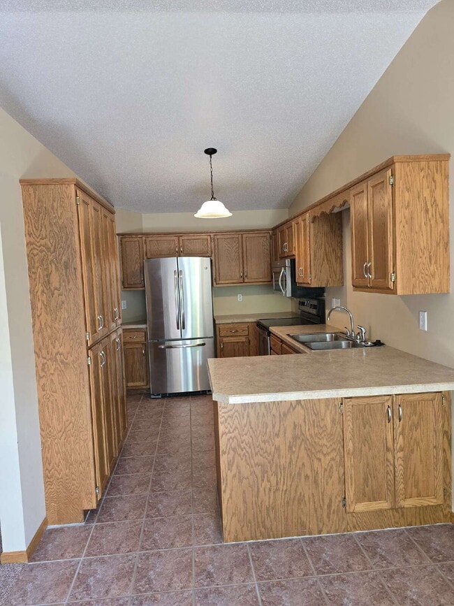 Building Photo - "Charming 3-Bedroom Fargo Home with 2 Full...