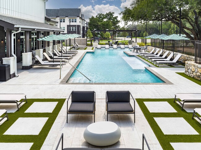 Escape to luxury at Modera Georgetown with our resort-style pool and spacious sundeck, perfect for ultimate relaxation. - Modera Georgetown Apartments