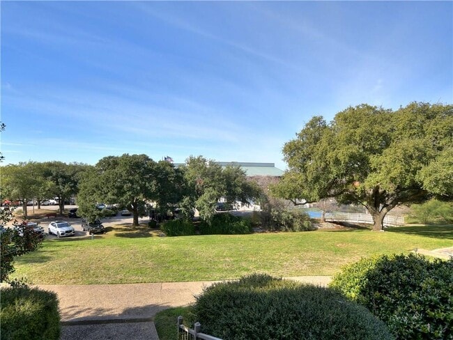 Photo - 120 World of Tennis Sq Unit 118C