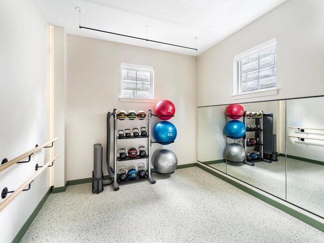 This light-filled studio is perfect for stretching, yoga, or low-impact movement—complete with medicine balls, kettlebells, and mounted ballet barres.