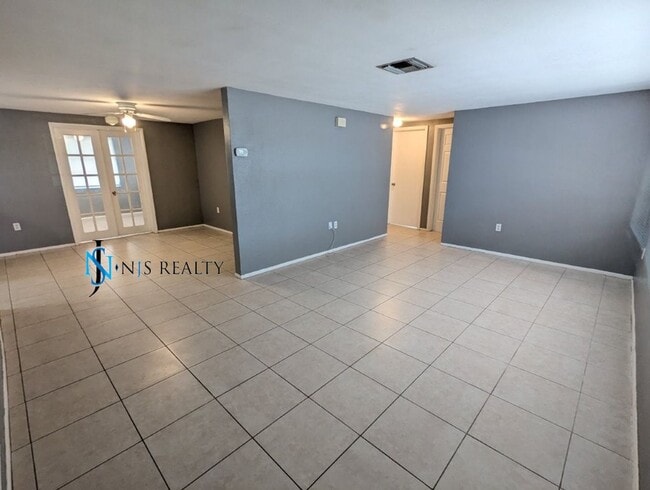 Photo - Large 1270 Sq. Ft. 3/2/1 tile floors, walk-in-closet, indoor laundry, fenced yard and spacious ki...