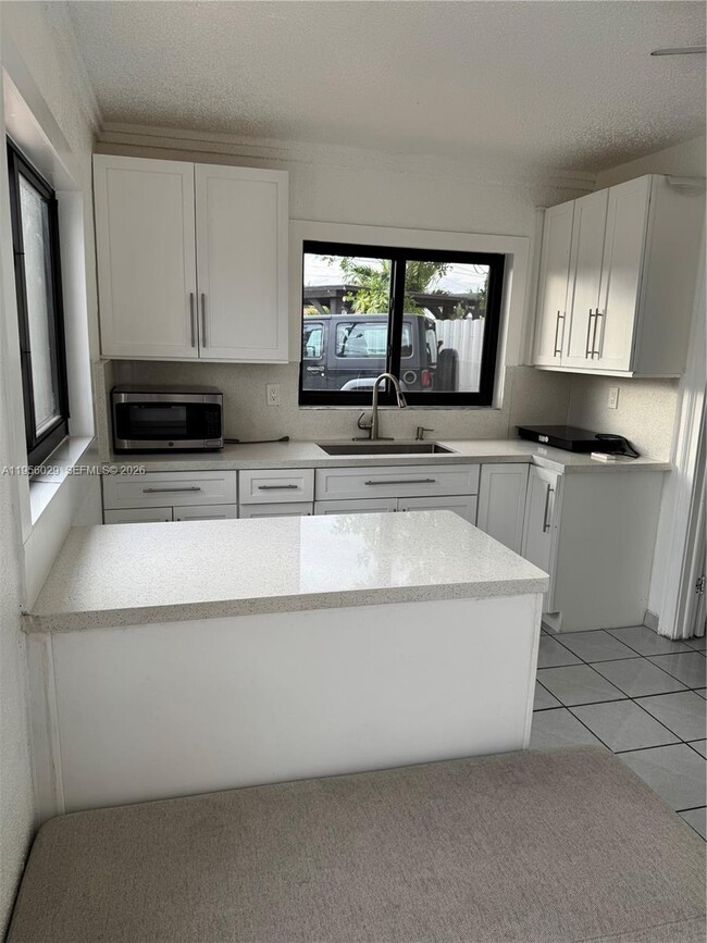 Building Photo - 8240 NW 181st St Unit 1