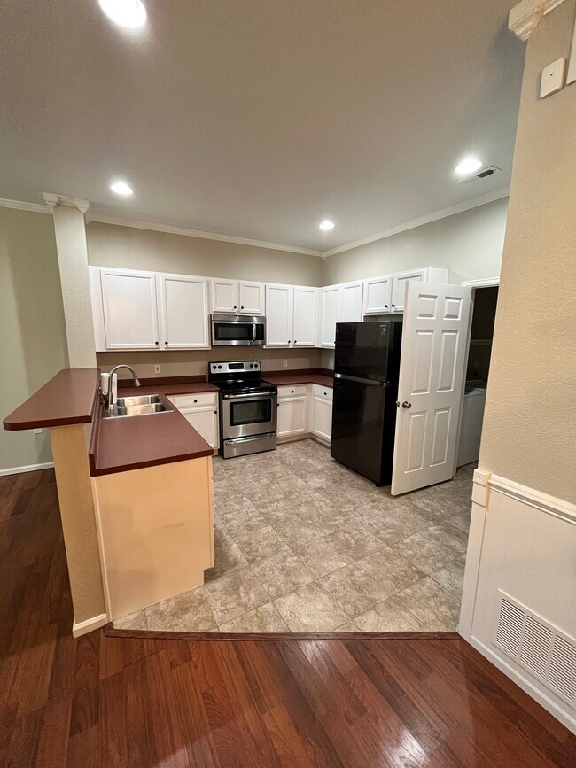 Kitchen - Access (Laundry / Garage) - 23003 E Ontario Dr Unit 104