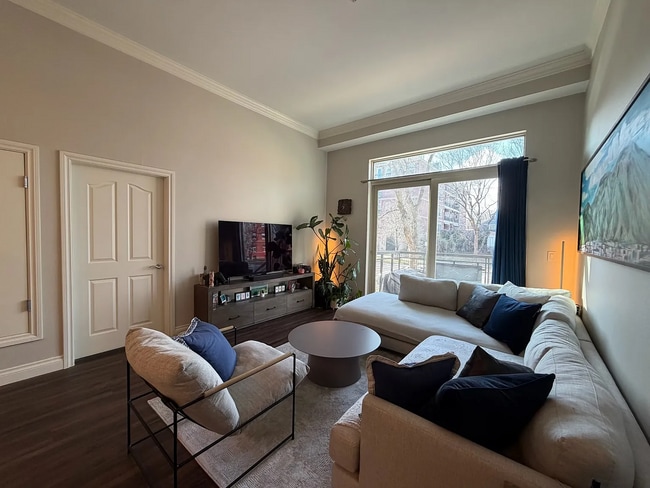 Open concept living with 11.5' vaulted ceilings and tons of natural light. - 1700 N Emerson St