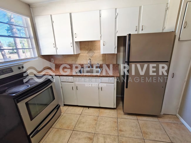 Building Photo - Quiet 2 Bedroom Retreat Available Now – Pets Welcome! Unit #4