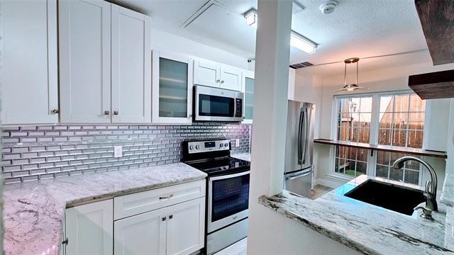 Building Photo - 3904 Rawlins St Unit 113 Rental