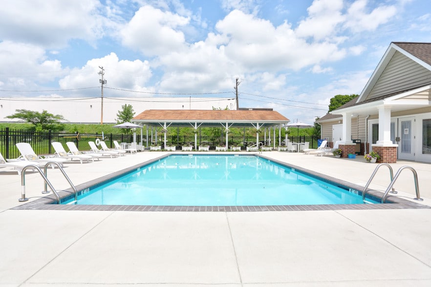 Sparkling Pool with Pavilion and Grills