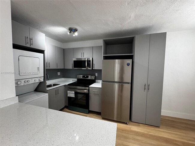 Building Photo - 7928 Harding Ave Unit 7