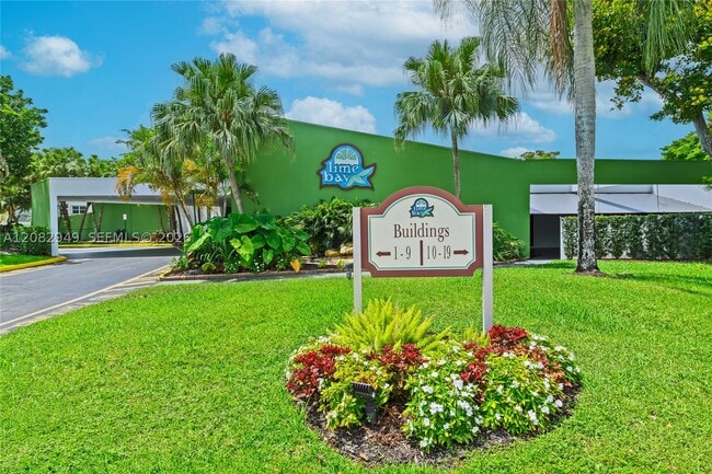 Building Photo - 9091 Lime Bay Blvd Unit 211