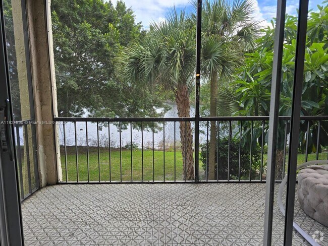 Building Photo - 3300 Spanish Moss Terrace Unit 210 Rental
