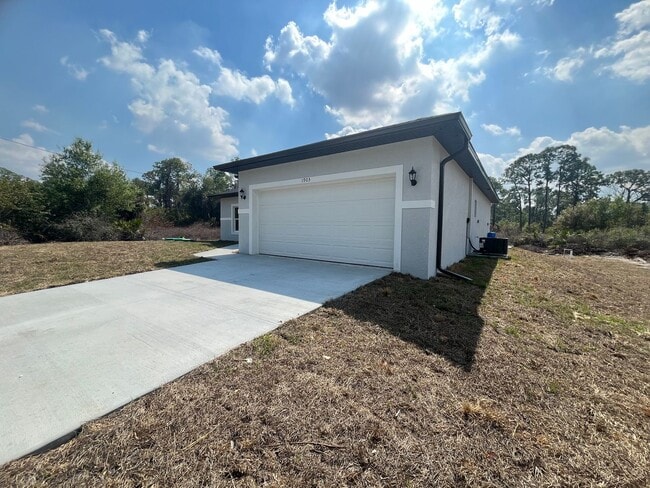Photo - MODERN BRAND NEW 4BD/2BA RETREAT IN LEHIGH ACRES!