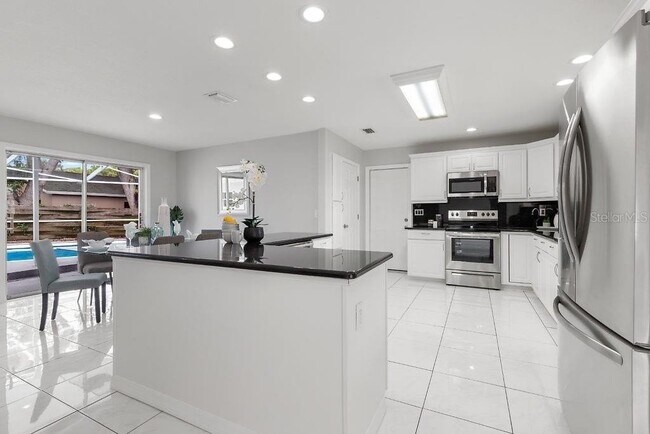 Photo - Remodeled Pool Home Located in the Very De...
