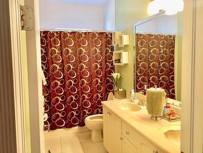 Photo - "Spacious 4-Bed Oasis with Granite Elegance & Pool in Miami Lakes"