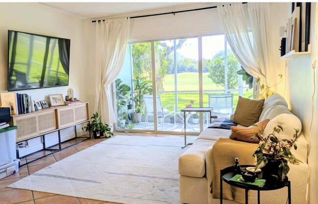 Building Photo - 3100 N Palm Aire Dr Unit 107