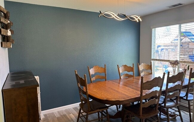 Photo - 3 bedroom 2 bath home with bonus room close to schools and shopping. Rv and or boat parking.