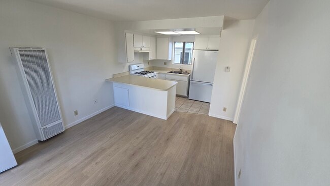 Building Photo - 3412 Falcon Ave Unit 3414-one half