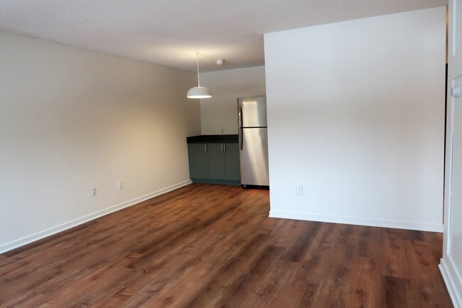Living room to kitchen - 2616 Harriet Ave S #203 Unit 203