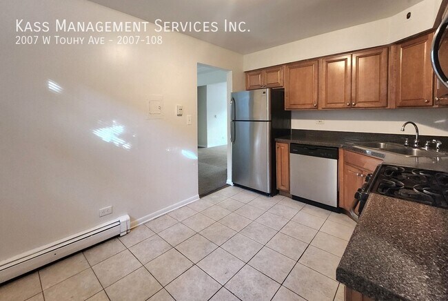 Photo - 2007 W Touhy Ave Unidad 2007-108