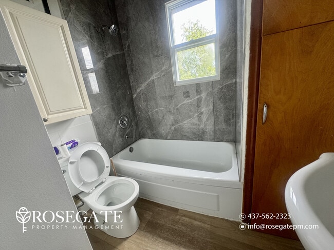 Photo - Cozy 1-Bedroom Apartment with Private Balcony & Parking – Cambridge Unit 5
