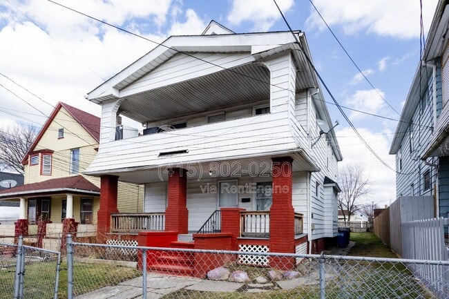 Building Photo - 3131 W 58th St Unit Down