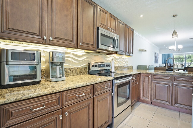 Building Photo - 1141 Calamondin Ter Unit 202