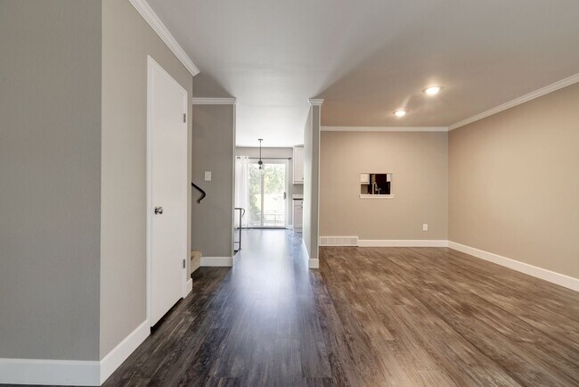 Photo - Spacious 4-Bedroom Home with Private Backyard and Solar Savings – Prime Location!