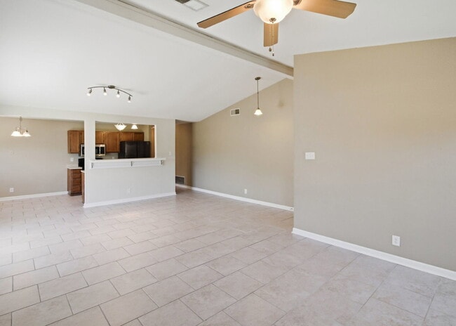 Corner-Lot Garden Home with a Private Patio.