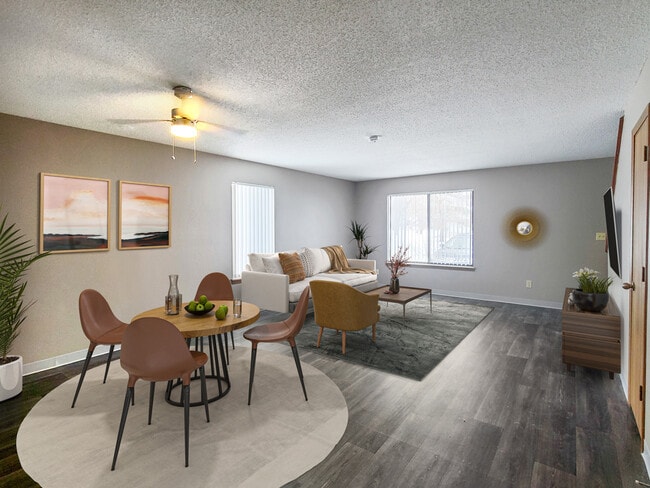 Renovated Three-Bedroom Apartment Living Room at Prairie West in Ames, IA