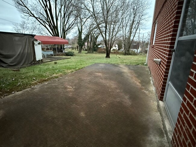 Photo - Updated 4BR Home with Finished Basement & Level Yard