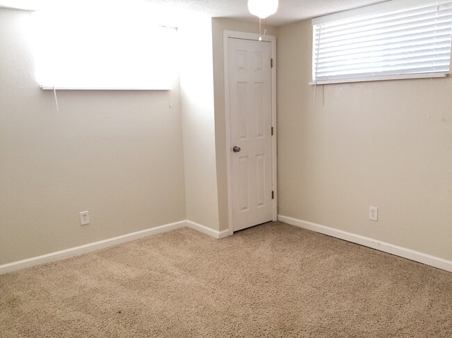 Bedroom 3 (downstairs) - 4660 Perry St House