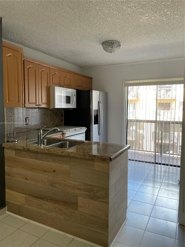 Photo - 5490 W 21st Ct Unit 308