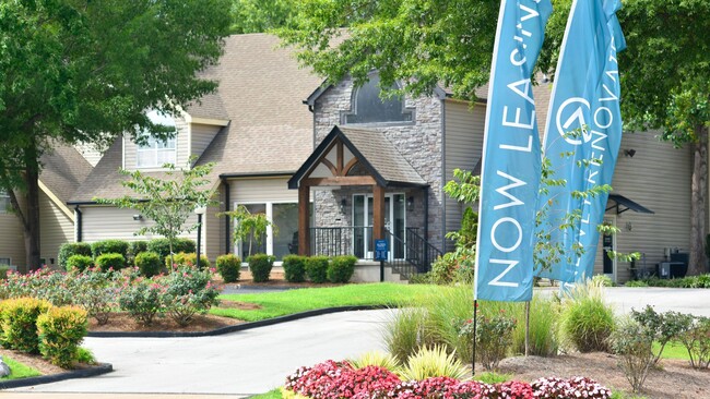 Lush Landscape Entrance - Alden Apartments