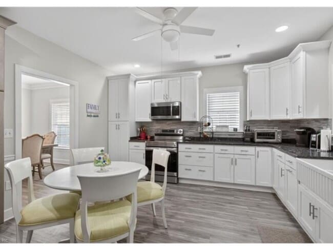 Photo - Beautifully located in a gated, well-kept, and highly sought-after bayfront community,