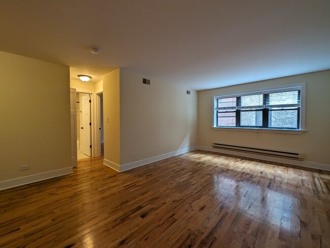 Building Photo - 557 W Arlington Pl Unit 205