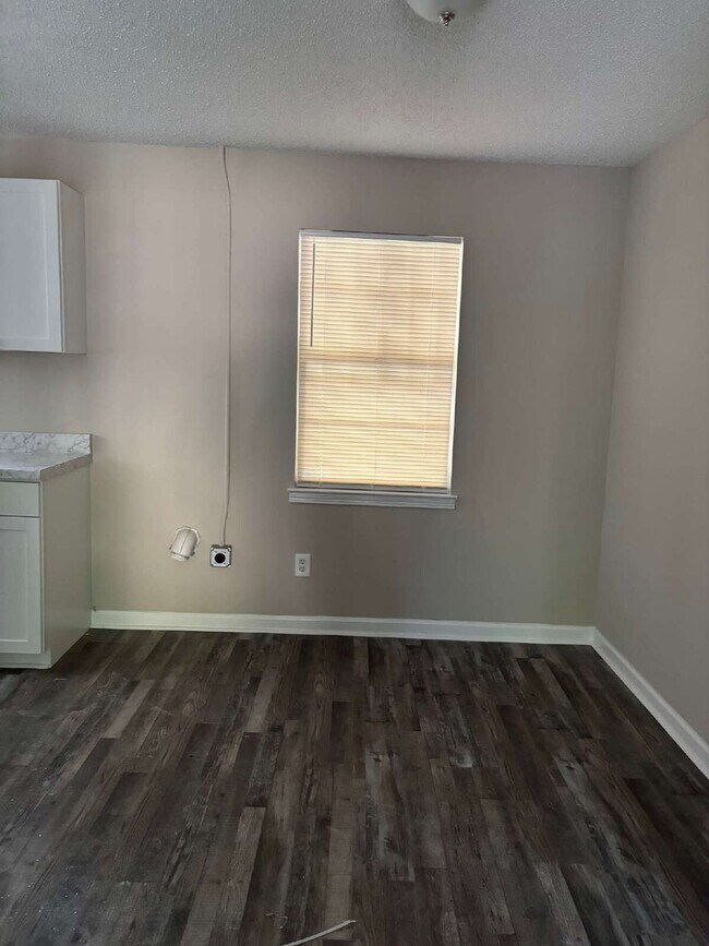 "Charming 3-Bedroom Retreat on Suncrest Drive with Gleaming Hardwood Floors!"