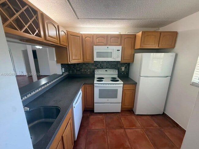 Building Photo - 3399 Foxcroft Rd Unit 104