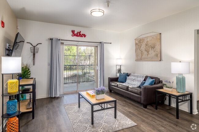 4BR, 4BA - 1,415SF - Living Room - GrandMarc at University Village