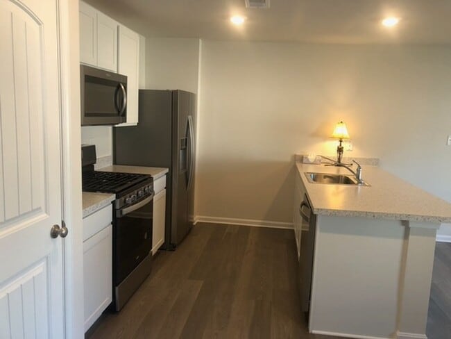 Photo - 4 Bedroom Home in desired community with pool.