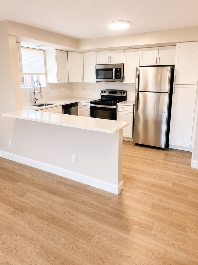 Cocina con isla - Stonehill Towers