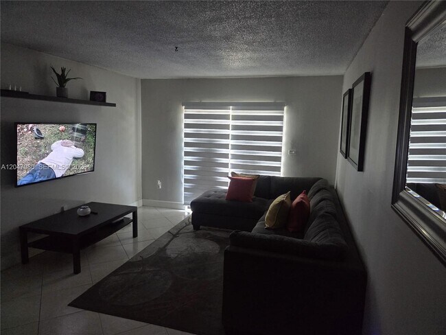 4265 NW S Tamiami Canal Dr Unit 1-208